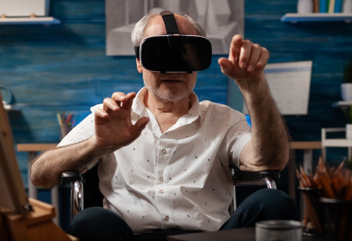 a picture showing a person with disability using XR technology